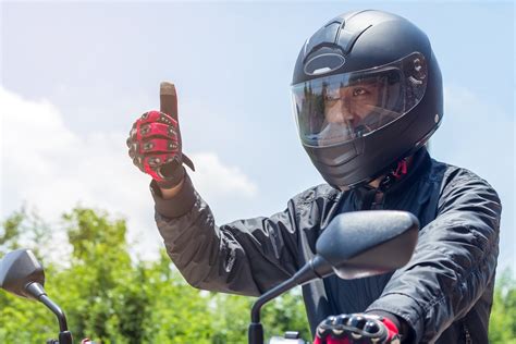 Do you have to wear a helmet when riding a bike, or can you just rely on your cat to guide you through traffic?